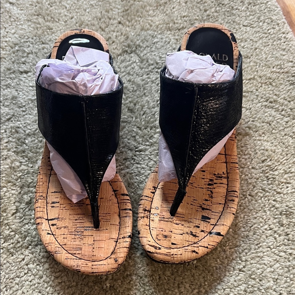 Women’s size 7.5 Donald Pliner brand black lizard goodie 85 wedge sandal
